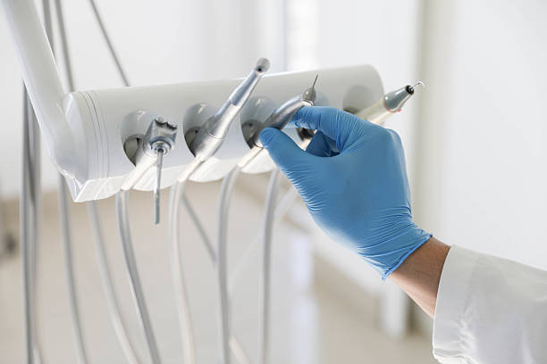 Professional Tooth Extraction technician working in Stevensville, MD